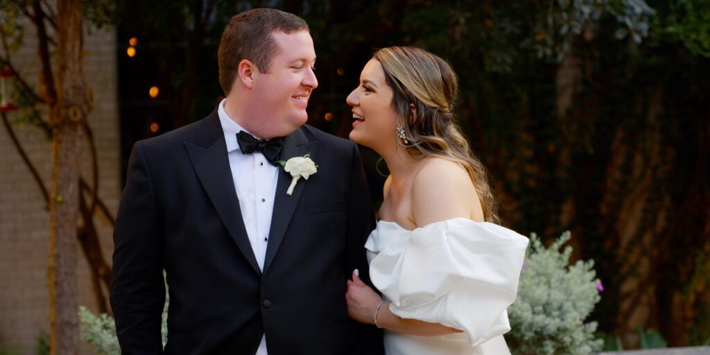 bride and groom outside on the San Antonio River Walk